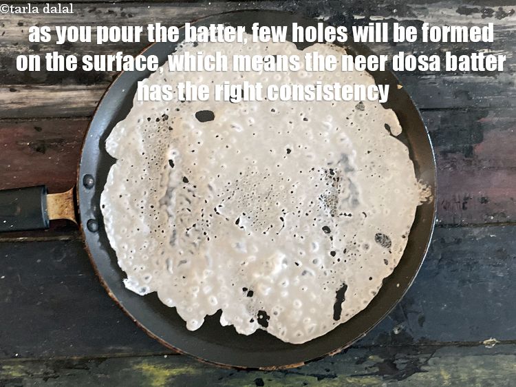 Step 27 – Tilt the tava (griddle) in a circular motion to make a round dosa. As you …