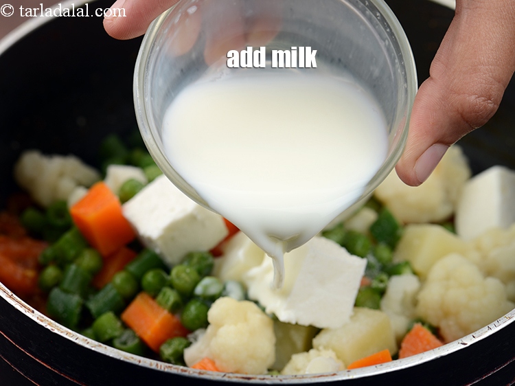 Step 32 – Add 1/4 cup&nbsp;<a href="https://www.tarladalal.com/glossary-milk-doodh-full-cream-milk-514i">milk</a>.