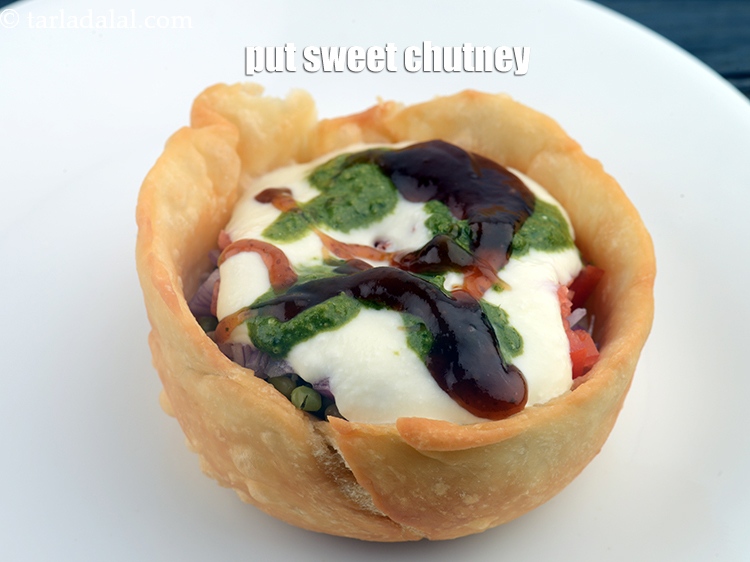 Step 29 – Put 2 tsp <a href="https://www.tarladalal.com/glossary-sprite-2796i">sweet chutney</a>.