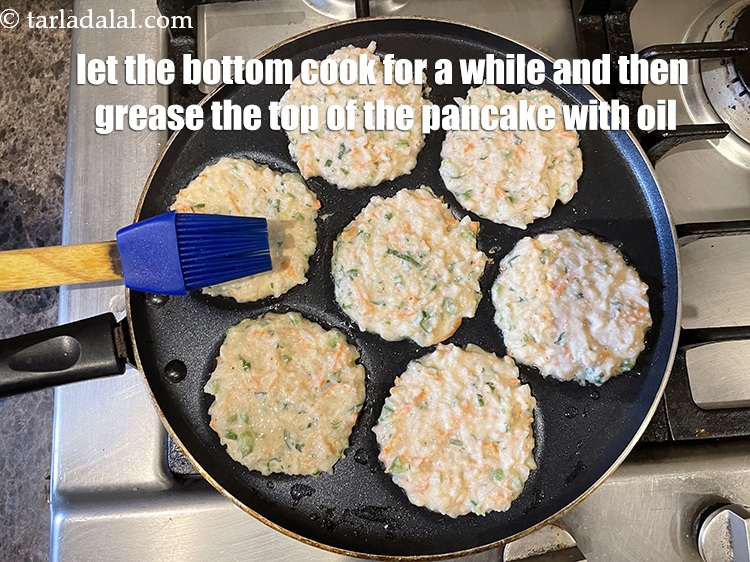 Step 27 – <meta charset="UTF-8" />Let the bottom of the pancakes cook for a while. Then grease the …