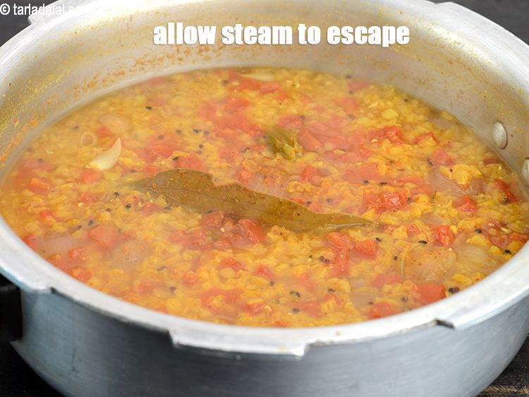 Step 27 – Allow the steam to escape before opening the lid.