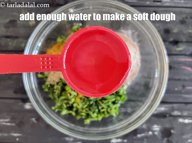 Step 35 – Add enough water to make a dough. We gradually added 4 tablespoons of water.