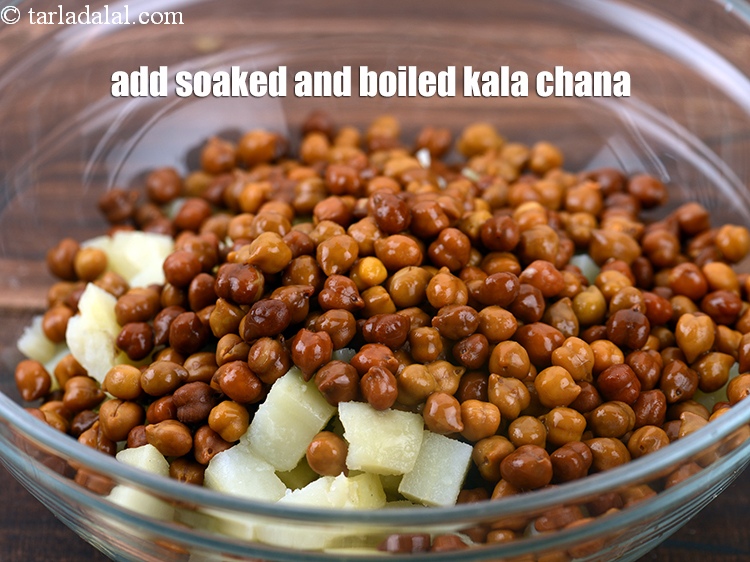 Step 30 – Add 1 cup soaked and&nbsp;<a href="https://www.tarladalal.com/glossary-boiled-kala-chana-1433i">boiled kala chana (brown chick peas)</a>.