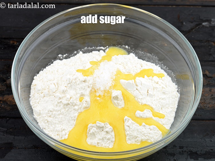 Step 34 – Add 1 tsp&nbsp;<a href="https://www.tarladalal.com/glossary-sugar-chini-shakkar-278i">sugar</a>.&nbsp;