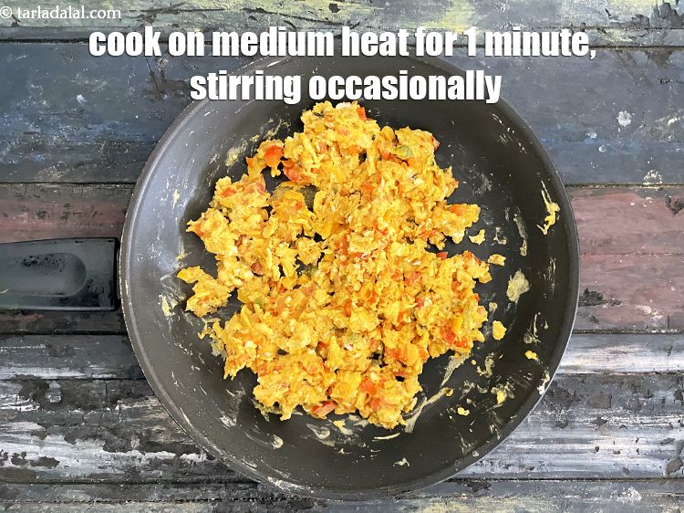 Step 28 – Cook on a medium flame<strong> </strong>for 1&nbsp;minute, while stirring continuously.