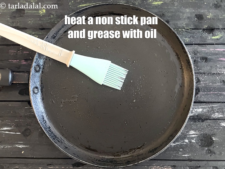 Step 29 – Heat a non-stick tava (griddle) and grease with oil.&nbsp;&nbsp;