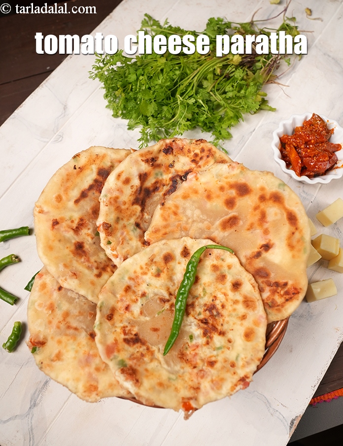 Step 28 – Serve <strong>paneer cheese chilli paratha |&nbsp;tomato cheese paratha |</strong>&nbsp;<strong>Indian cheese paneer paratha |&nbsp;</strong>hot with raita …