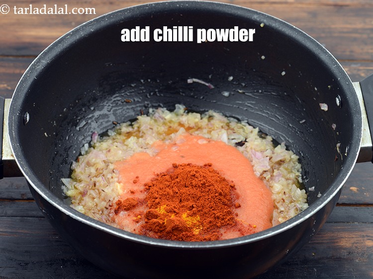Step 28 – Add 1 tbsp&nbsp;<a href="https://www.tarladalal.com/glossary-chilli-powder-red-chilli-powder-339i" target="_blank">chilli powder</a>.