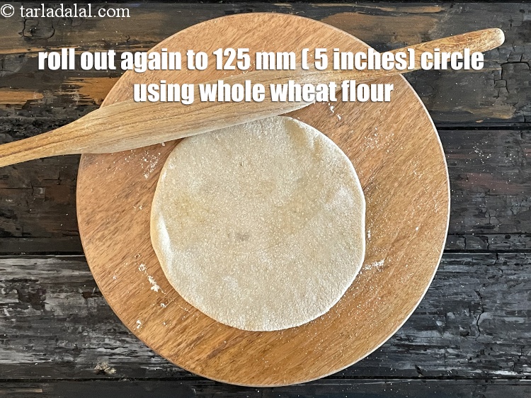 Step 27 – Roll out again into a circle of 125 mm. (5&quot;) diameter using whole wheat flour …