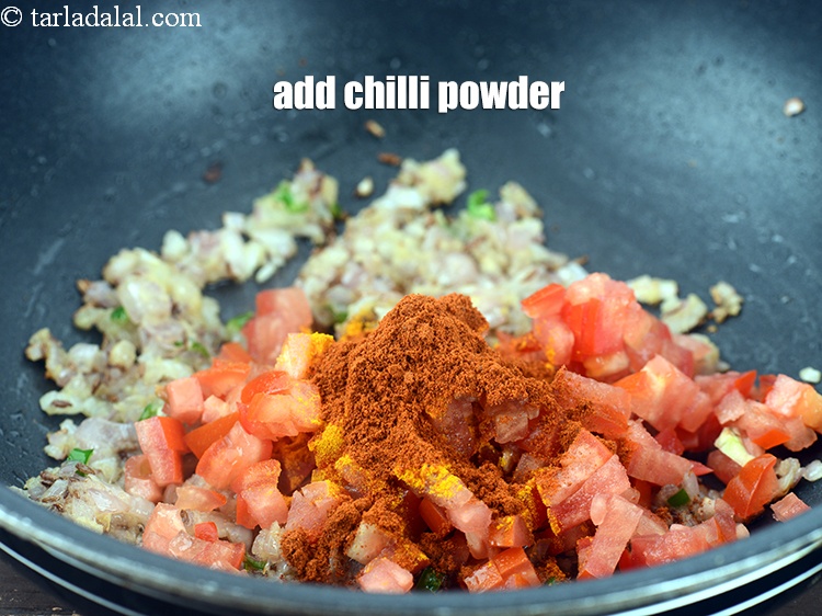 Step 27 – Add 2 tsp <a href="https://www.tarladalal.com/glossary-chilli-powder-red-chilli-powder-339i">chilli powder</a>.