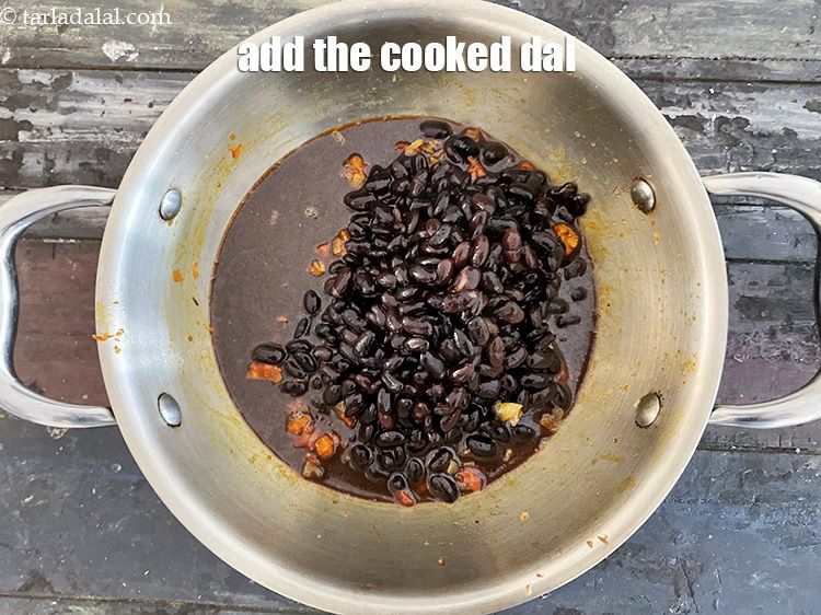 Step 36 – Add the cooked dal (including the water).