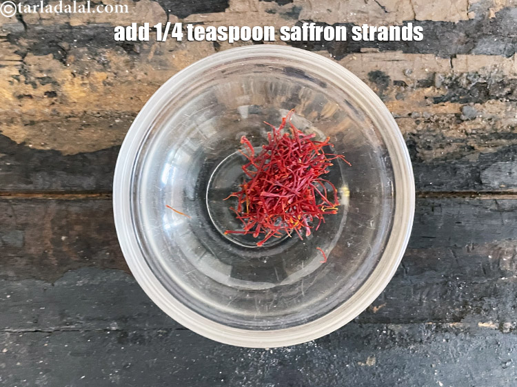 Step 33 – Add&nbsp;<meta charset="UTF-8" />1/4 tsp&nbsp;<a href="glossary-saffron-kesar-520i">saffron (kesar) strands</a>.