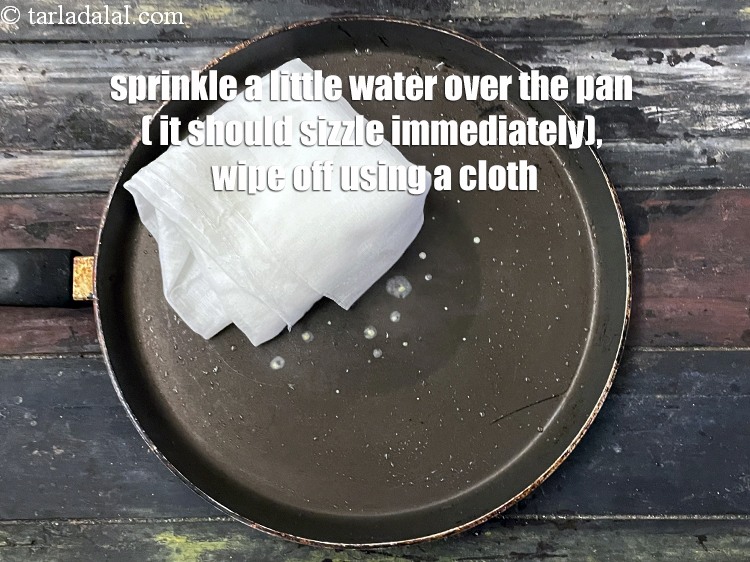 Step 28 – Sprinkle a little water on it (it should sizzle immediately) and wipe off using a …