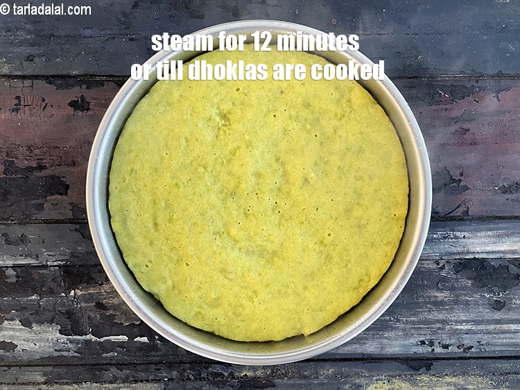 Step 27 – <meta charset="UTF-8" /> Steam in steamer for 12 minutes or till the dhoklas are cooked. …