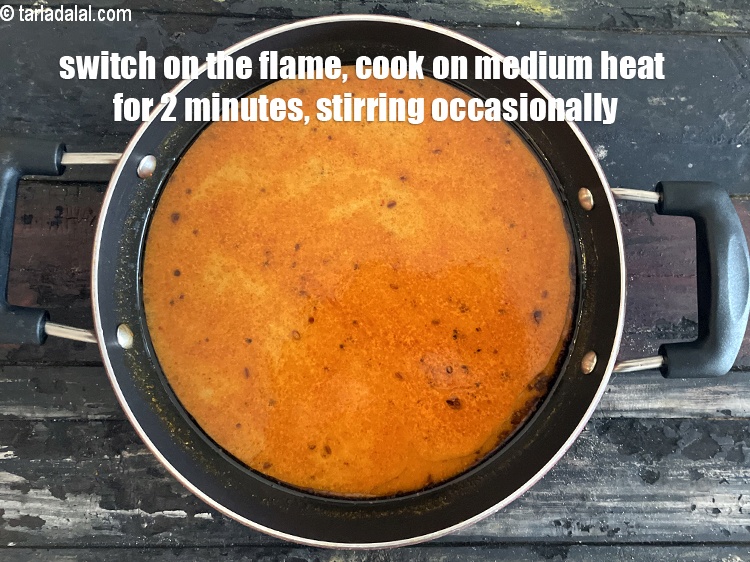 Step 29 – Switch on the flame and cook on a medium flame for 2 minutes, while stirring …