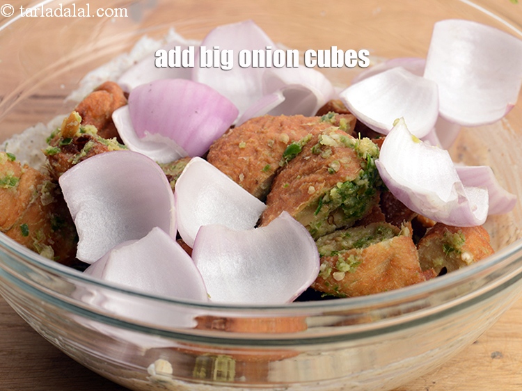 Step 30 – Add 1 cup big <a href="https://www.tarladalal.com/glossary-onion-cubes-732i">onion cubes</a>.
