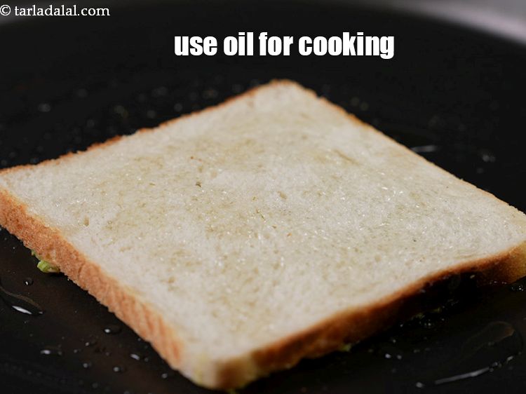 Step 27 – Cook using 2 tsp <a href="https://www.tarladalal.com/glossary-oil-671i">oil</a>.&nbsp;