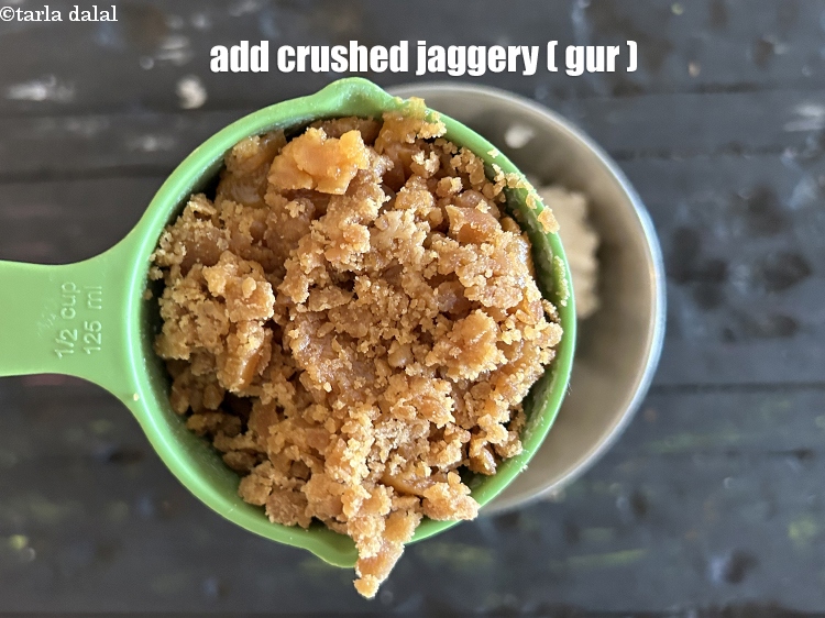 Step 28 – Add&nbsp;<meta charset="UTF-8" />1/2 cup&nbsp;crushed&nbsp;<a href="glossary-jaggery-gur-gud-kala-gud-477i">jaggery (gur)</a>.