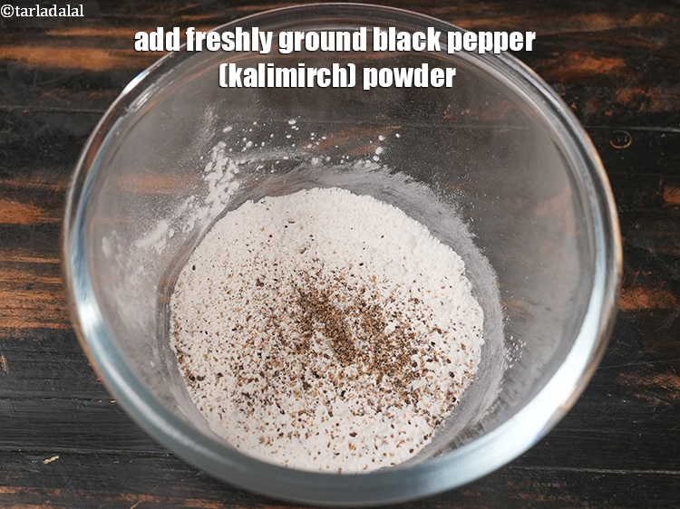Step 28 – Add <a href="https://www.tarladalal.com/glossary-freshly-ground-black-pepper-kalimirch-powder-kali-mirch-ka-powder-567i">freshly ground black pepper (kalimirch)</a>&nbsp;powder to taste.