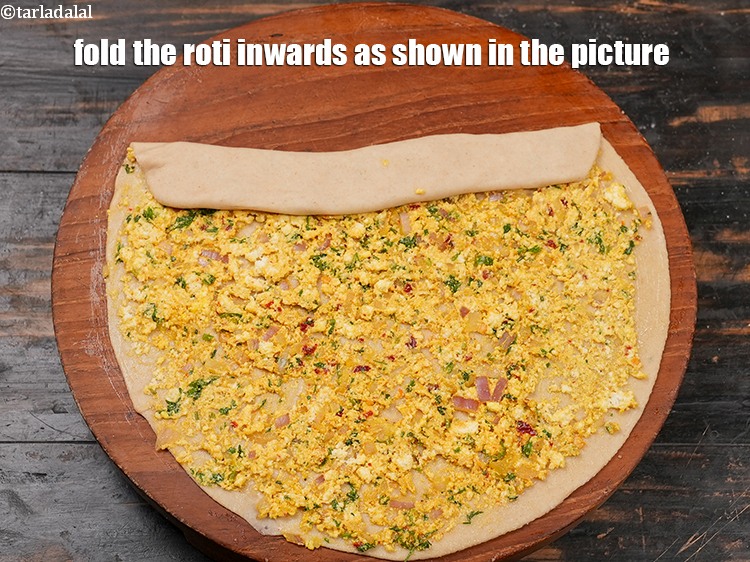 Step 28 – Fold the roti inwards as shown in the picture.