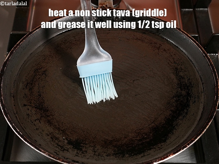 Step 35 – Heat a non stick tava (griddle) and grease it well using 1/2 tsp oil.<br /> …