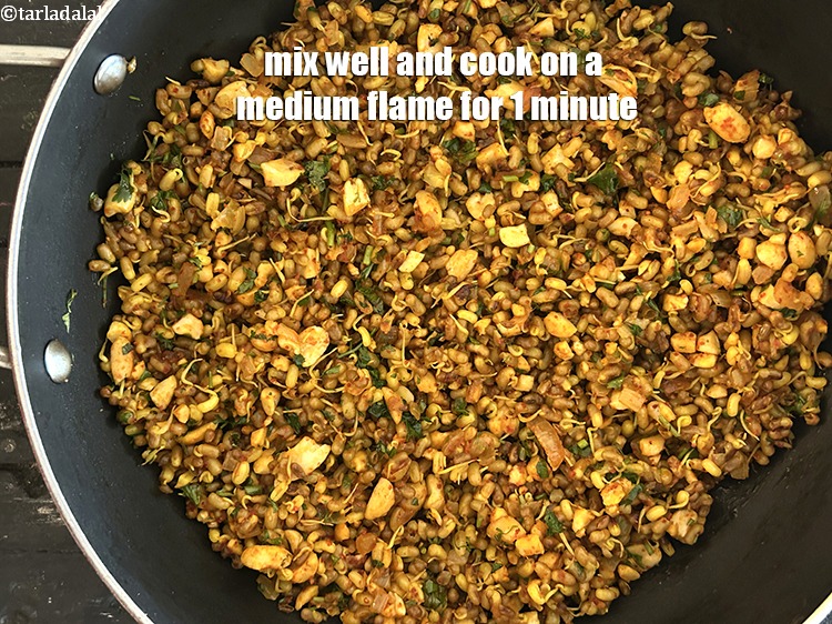 Step 29 – Mix well and cook on a medium flame for 1 minute.