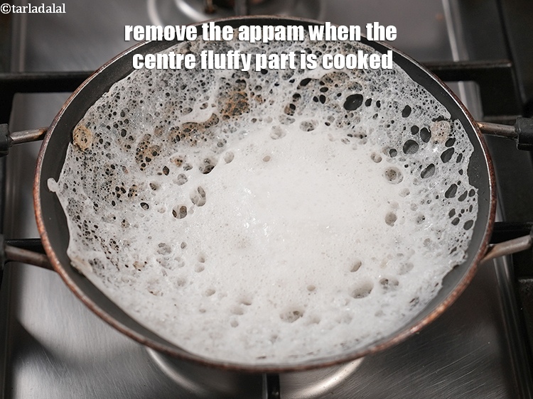 Step 33 – Remove the appam when the centre fluffy part is cooked.