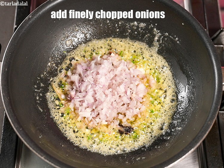 Step 28 – Add &frac12; cup finely&nbsp;<a href="https://www.tarladalal.com/glossary-chopped-onions-722i">chopped onions</a>.