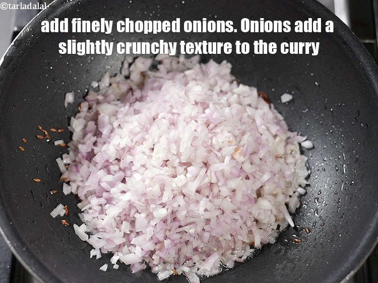 Step 28 – Add 1&frac12; cups finely&nbsp;<a href="https://www.tarladalal.com/glossary-chopped-onions-722i">chopped onions</a>. Onions add a slightly crunchy texture to the curry