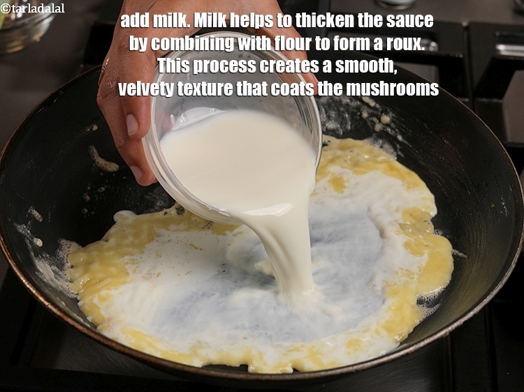 Step 29 – Add 1 cup <a href="https://www.tarladalal.com/glossary-milk-doodh-full-cream-milk-514i">milk</a>. Milk helps to thicken the sauce by combining with flour …
