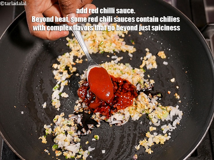 Step 27 – Add 2 tsp <a href="https://www.tarladalal.com/glossary-red-chilli-sauce-lal-chilli-sauce-810i">red chilli sauce</a>. Beyond heat, some red chili sauces contain chilies …