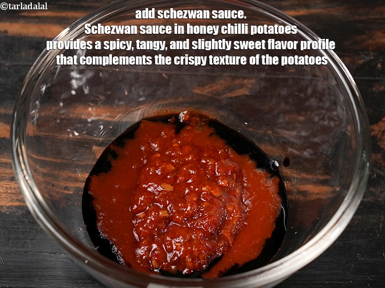 Step 27 – Add 1 tbsp&nbsp;<a href="https://www.tarladalal.com/glossary-schezwan-sauce-schezuan-sauce-1872i">schezwan sauce</a>. Schezwan sauce in honey chilli potatoes provides a spicy, tangy, …