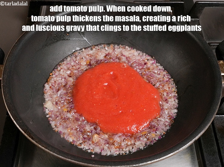 Step 28 – Add &frac12; cup <a href="https://www.tarladalal.com/glossary-tomato-pulp-tamatar-ka-pulp-1039i">tomato pulp</a>. When cooked down, tomato pulp thickens the masala, creating …
