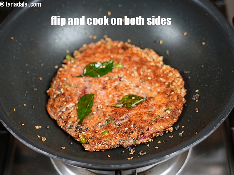 Step 28 – Flip and cook on both the sides until golden brown and crisp.