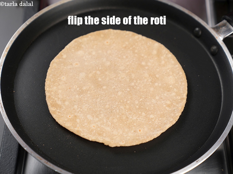 Step 30 – Flip the side of the roti.