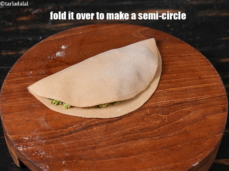 Step 27 – Fold it over to make a semi-circle.