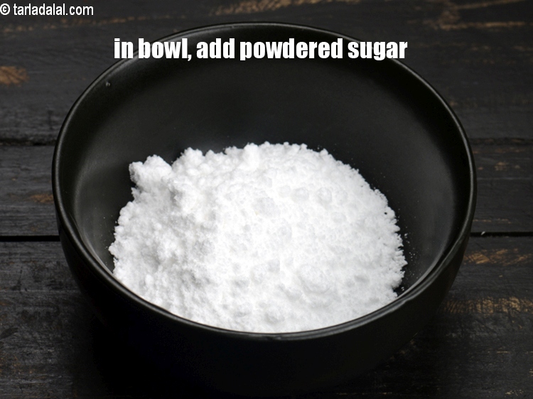 Step 33 – In a small bowl, add &frac14; cup&nbsp;<a href="https://www.tarladalal.com/glossary-powdered-sugar-280i">powdered sugar</a>.