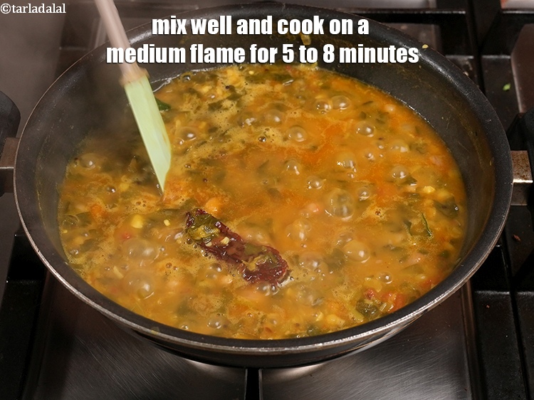 Step 28 – Mix well and cook on a medium flame for 5 to 8 minutes.