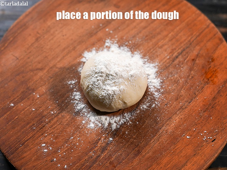 Step 29 – Place a portion of the dough on a clean dry surface.