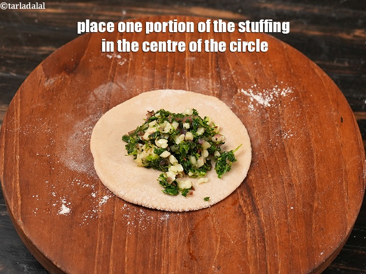 Step 29 – Place one portion of the stuffing in the centre of the circle.
