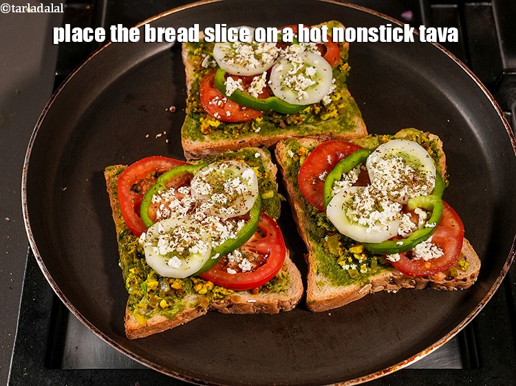 Step 28 – Place the bread slice on a hot nonstick tava.&nbsp;