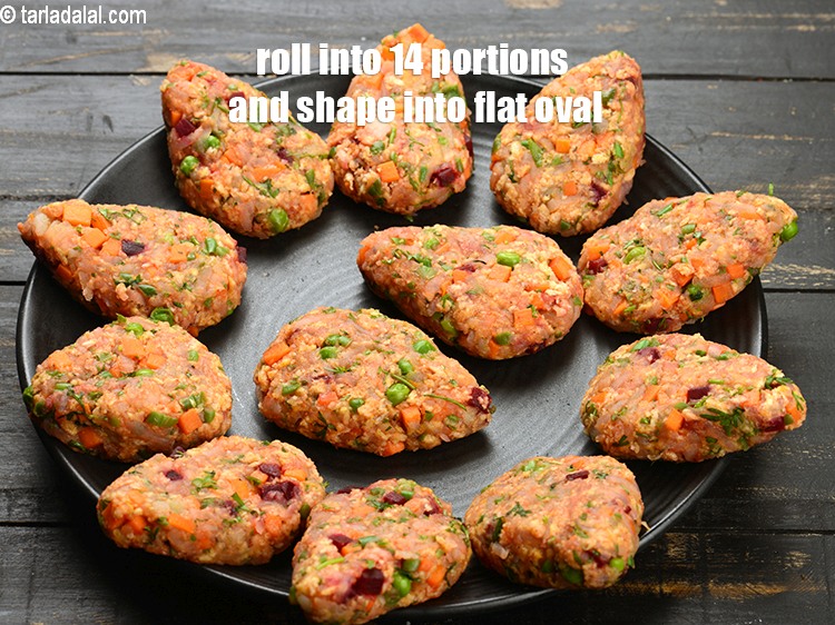 Step 29 – Divide and roll the mixture into 14 equal portions and shape each portion into a …