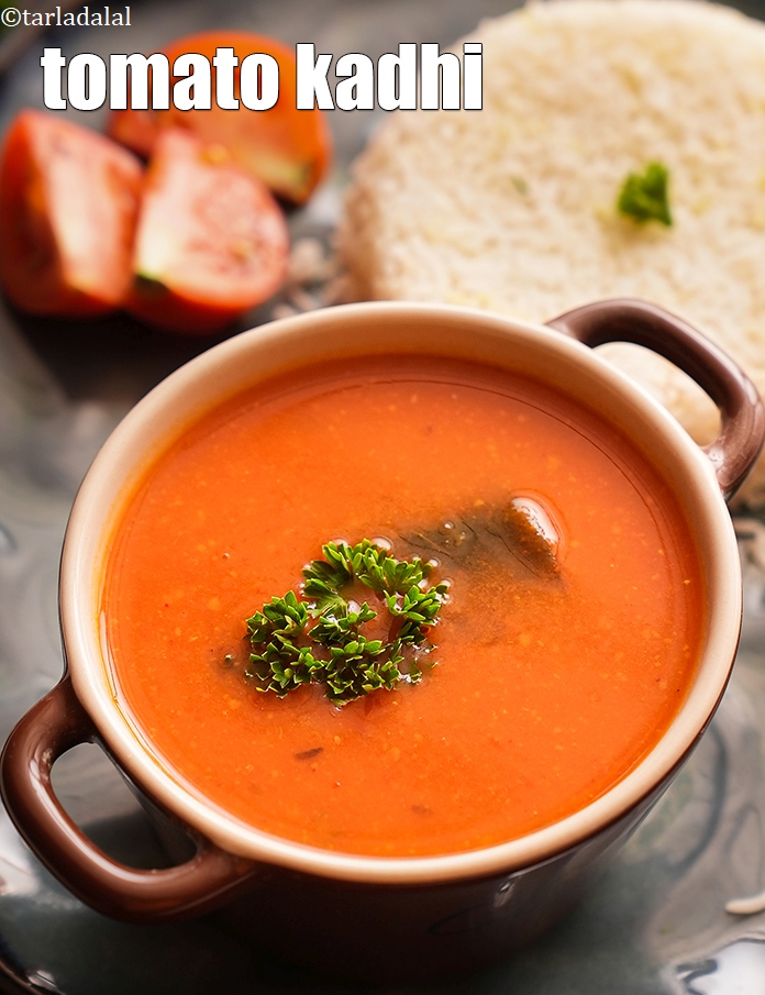 Step 28 – Serve <strong>tamatar ki kadhi | &nbsp;tomato kadhi | Jain tomato curry |&nbsp;</strong>hot garnished with a …