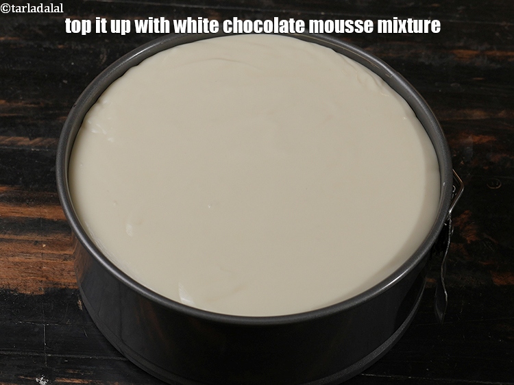 Step 28 – Top it up with white chocolate mousse mixture.