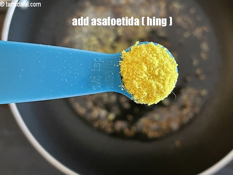 Step 29 – Add&nbsp;<meta charset="UTF-8" />1/4 tsp&nbsp;<a href="glossary-asafoetida-hing-113i">asafoetida (hing)</a>.