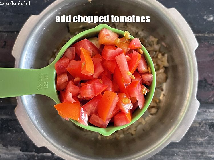 Step 28 – Add&nbsp;<meta charset="UTF-8" />1/2 cup&nbsp;<a href="glossary-chopped-tomatoes-779i">chopped tomatoes</a>.