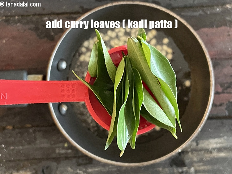 Step 34 – Add&nbsp;<meta charset="UTF-8" />8 to 10&nbsp;<a href="glossary-curry-leaves-kadi-patta-kadipatta-388i">curry leaves (kadi patta)</a>.
