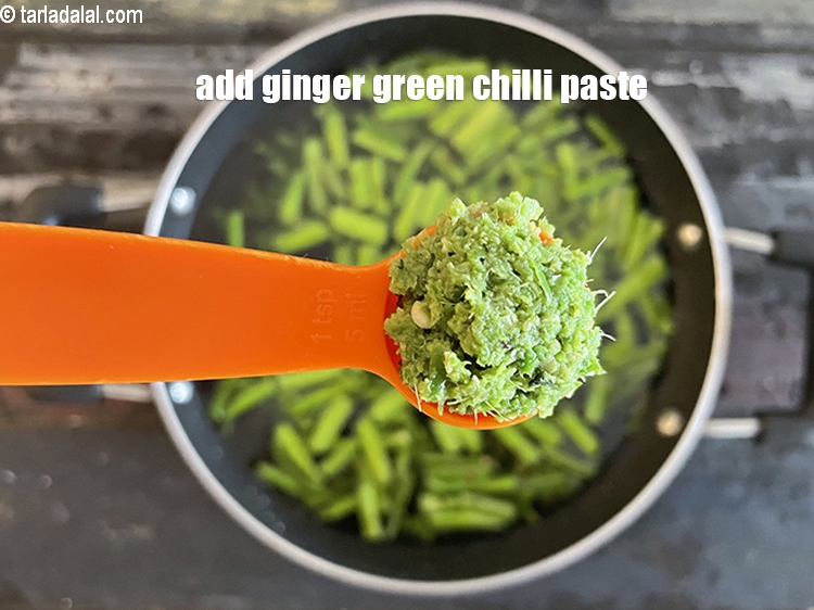 Step 28 – Add&nbsp;<meta charset="UTF-8" />1 tsp&nbsp;<a href="glossary-ginger-green-chilli-paste-adrak-mirch-ki-paste-adrak-mirchi-paste-139i">ginger-green chilli paste</a>.