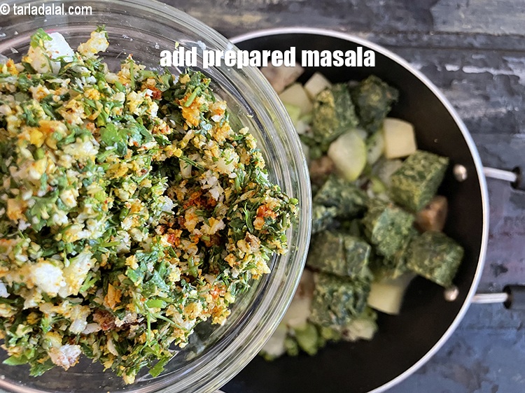 Step 29 – Add prepared coocnut coriander masala for the<strong> panchkutiyu shaak.</strong>