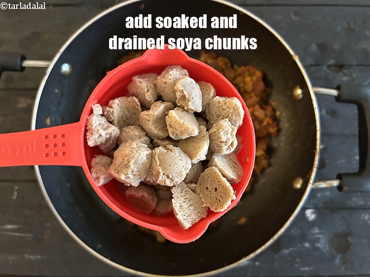 Step 34 – Add&nbsp;<meta charset="UTF-8" />1 cup&nbsp;<a href="glossary-soaked-and-chopped-soy-chunks-1631i">soya chunks (nuggets)</a>, soaked , drained and chopped